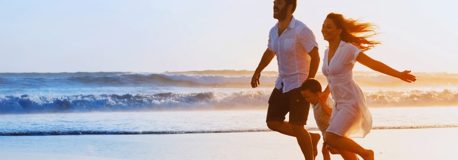 couple running on the beach